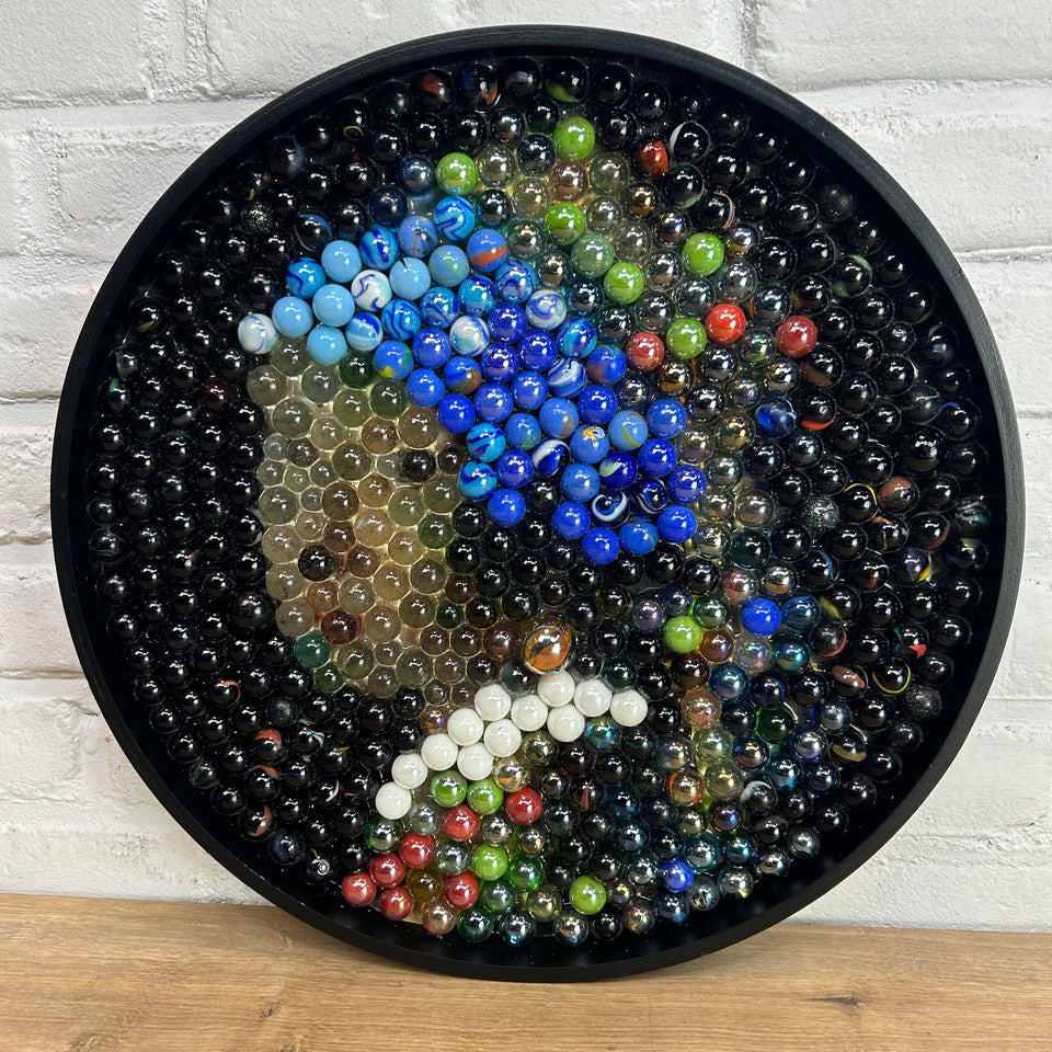 Girl with a pearl earring made of Marbles - Pearled Reflections