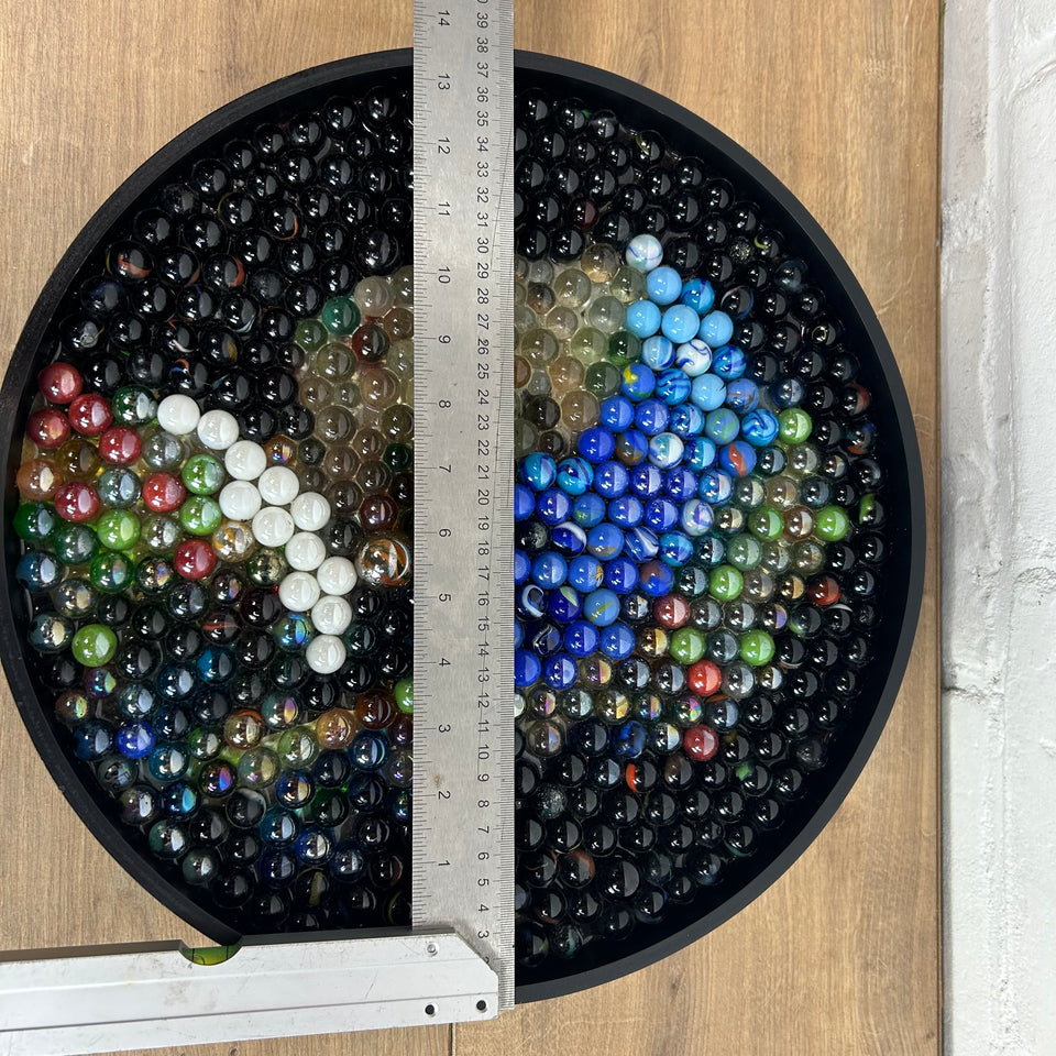 Girl with a pearl earring made of Marbles - Pearled Reflections
