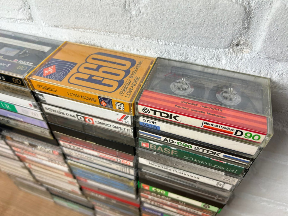 A bulk lot of 100 mixed cassette tapes (buy more with 10 percent more for free)