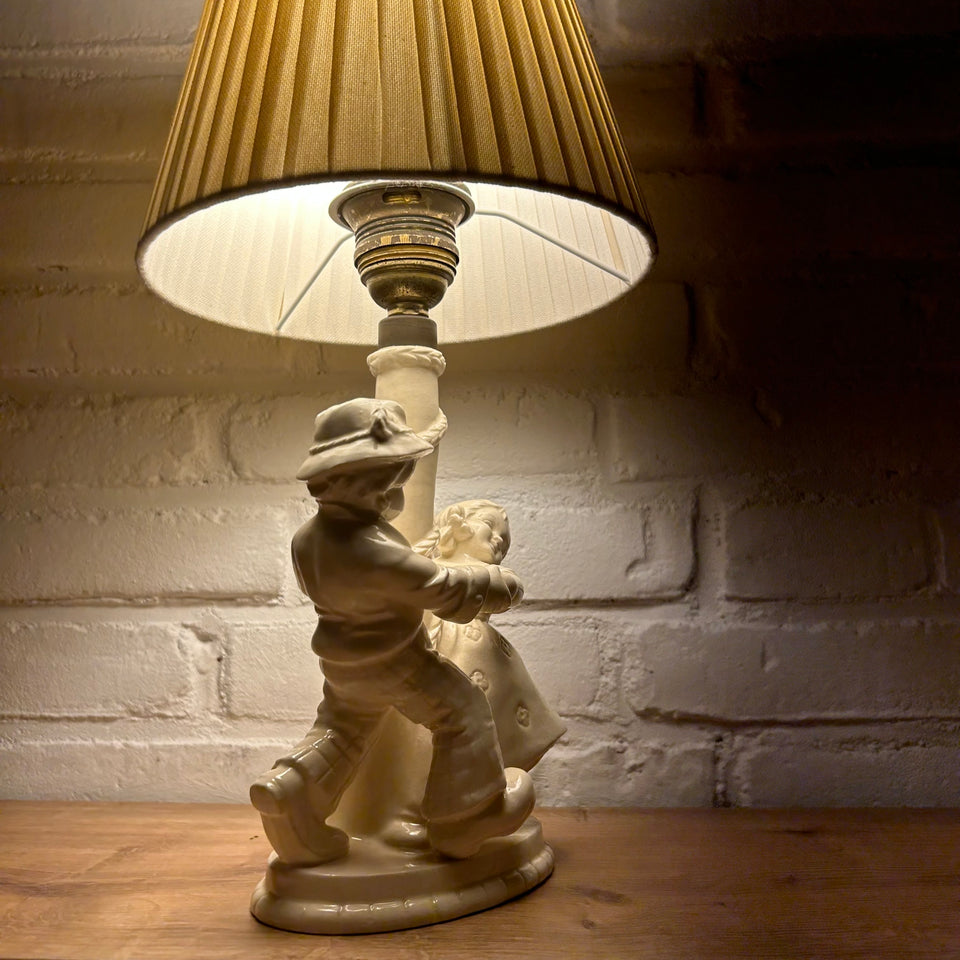 IN AUCTION : Antique Porcelain Children figurines, playing Lamp holder with Santa & Cole lampshade