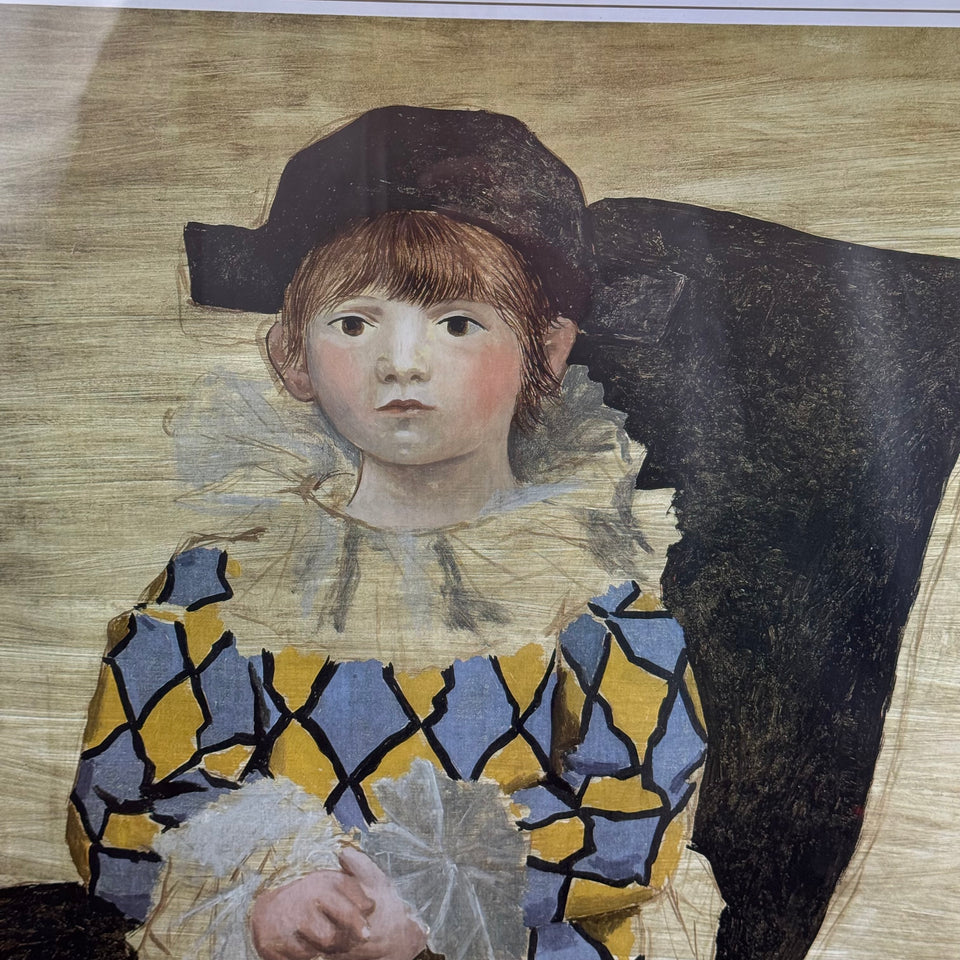 Paul as Harlequin by Pablo Picasso (1881-1973)