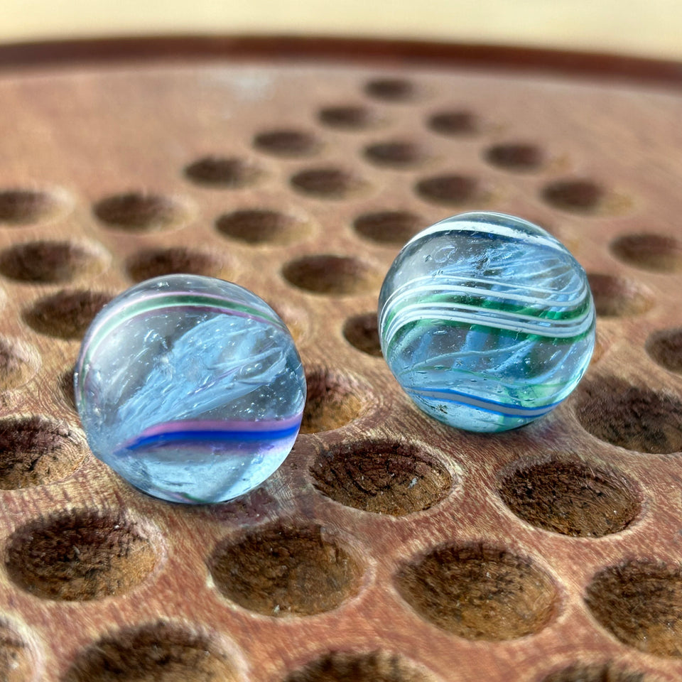 Two Antique handmade German Latino core swirl glass marbles