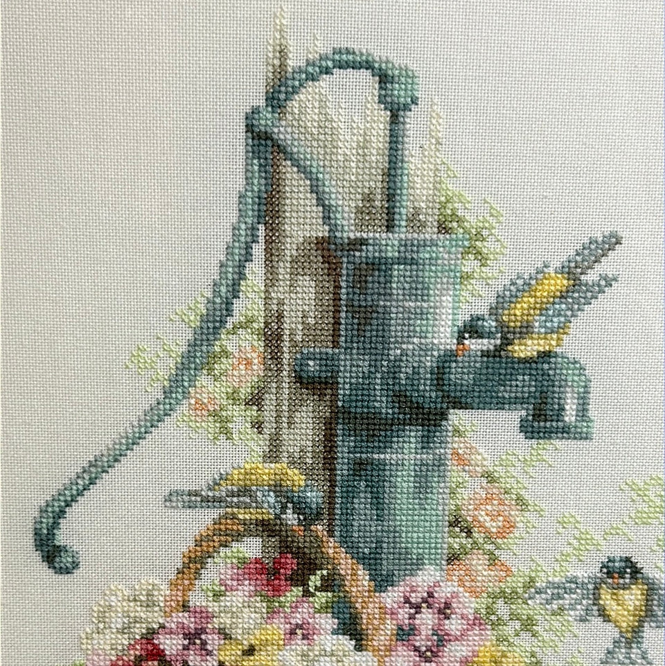 Flowers around antique water well with signature - Embroidery - Tapestry - Patchwork - Cotton work - Framed