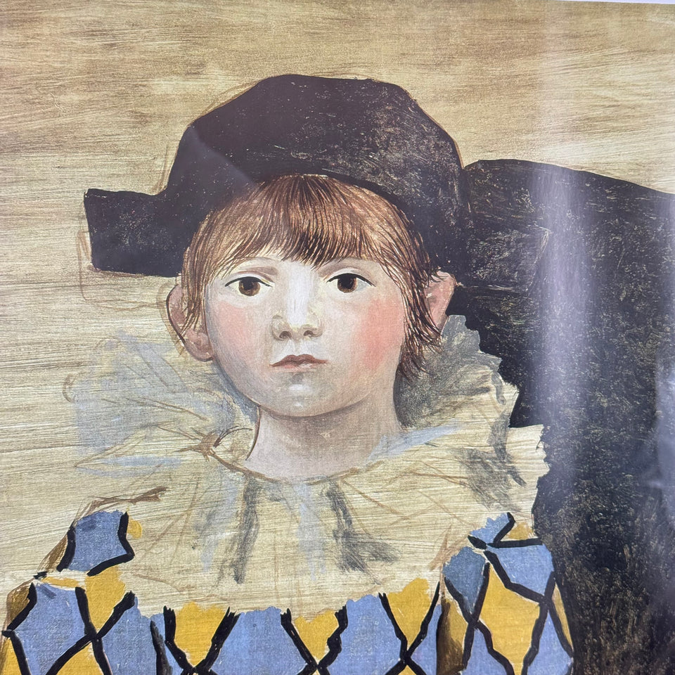 Paul as Harlequin by Pablo Picasso (1881-1973)