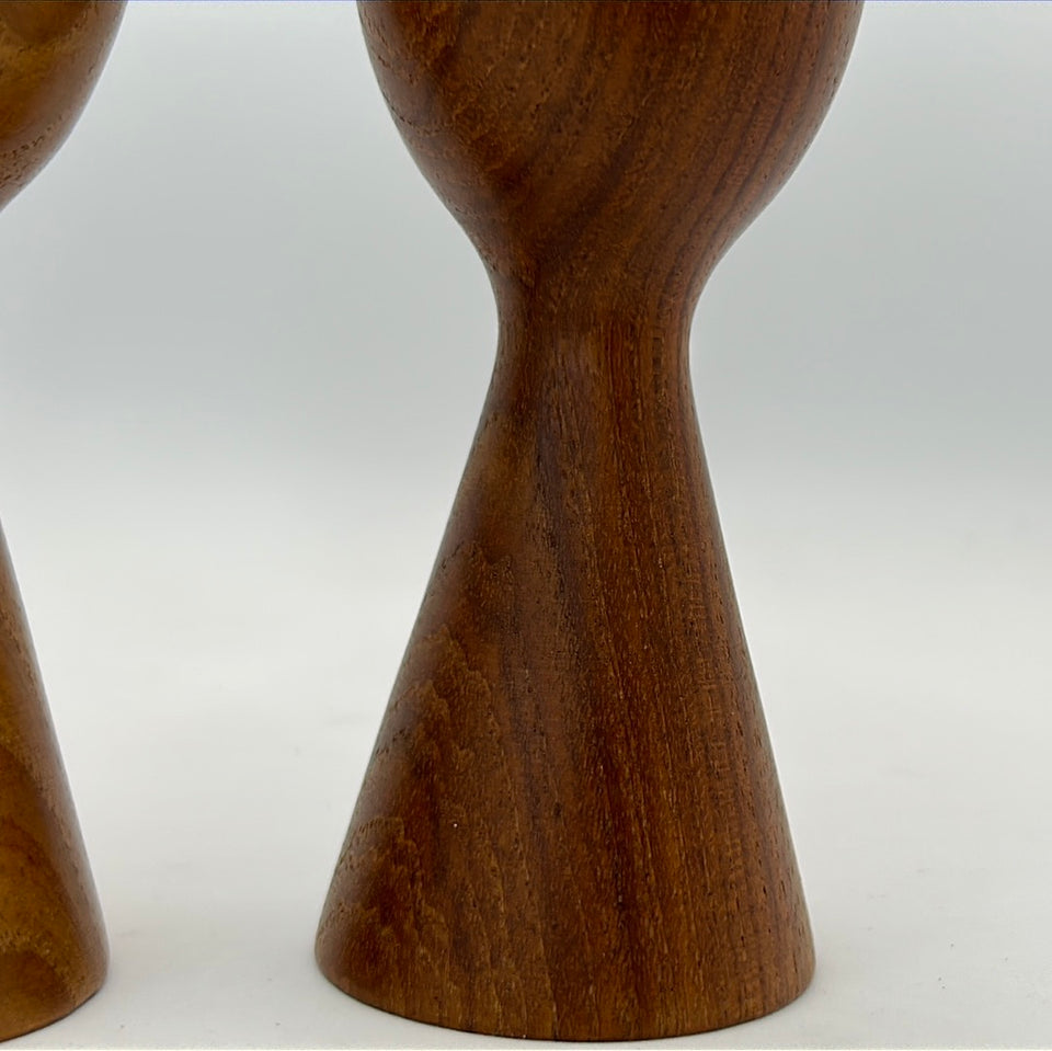 Two teak wood 60’s Danish design Candlesticks