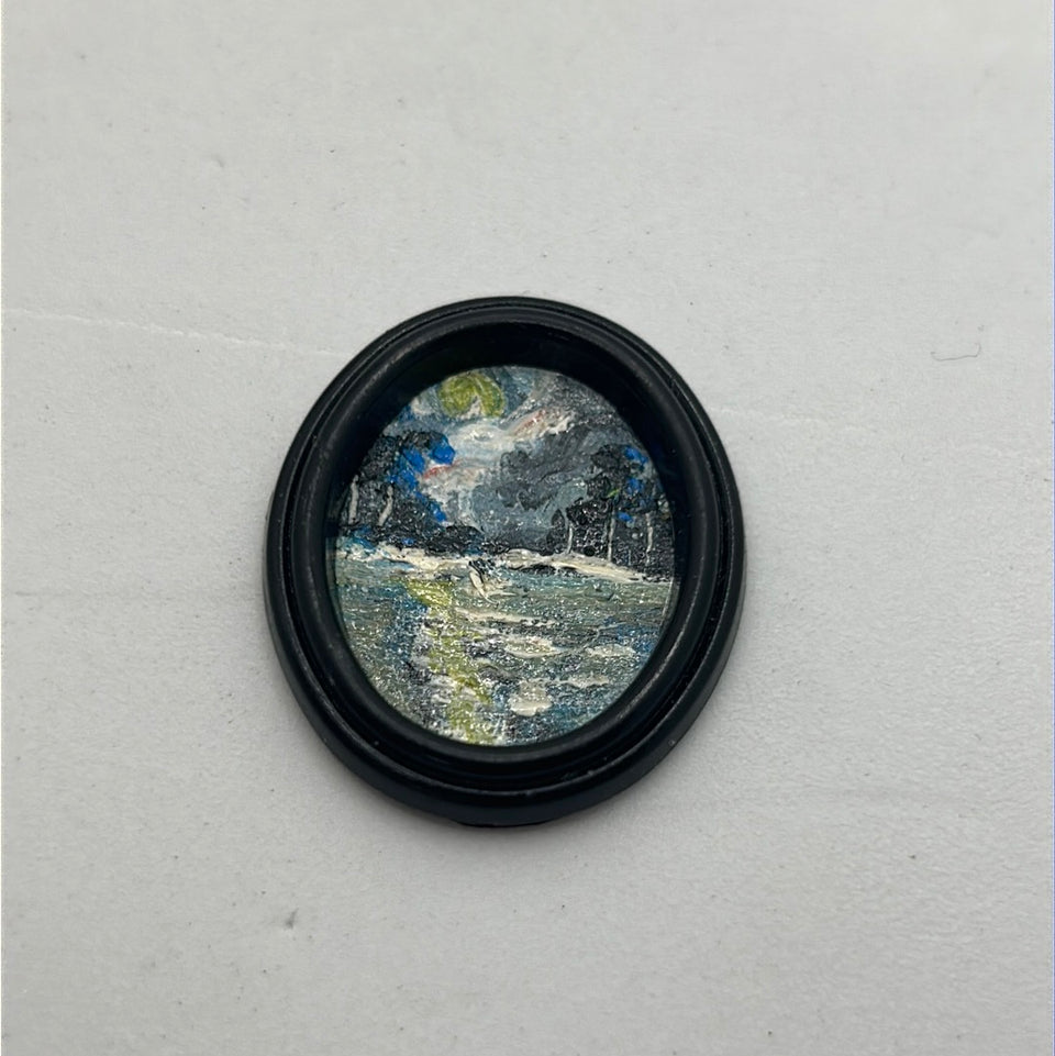 Miniature oil painting in oval frame