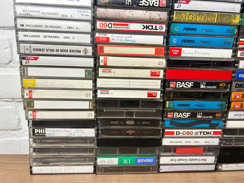 A bulk lot of 100 mixed cassette tapes (buy more with 10 percent more for free)