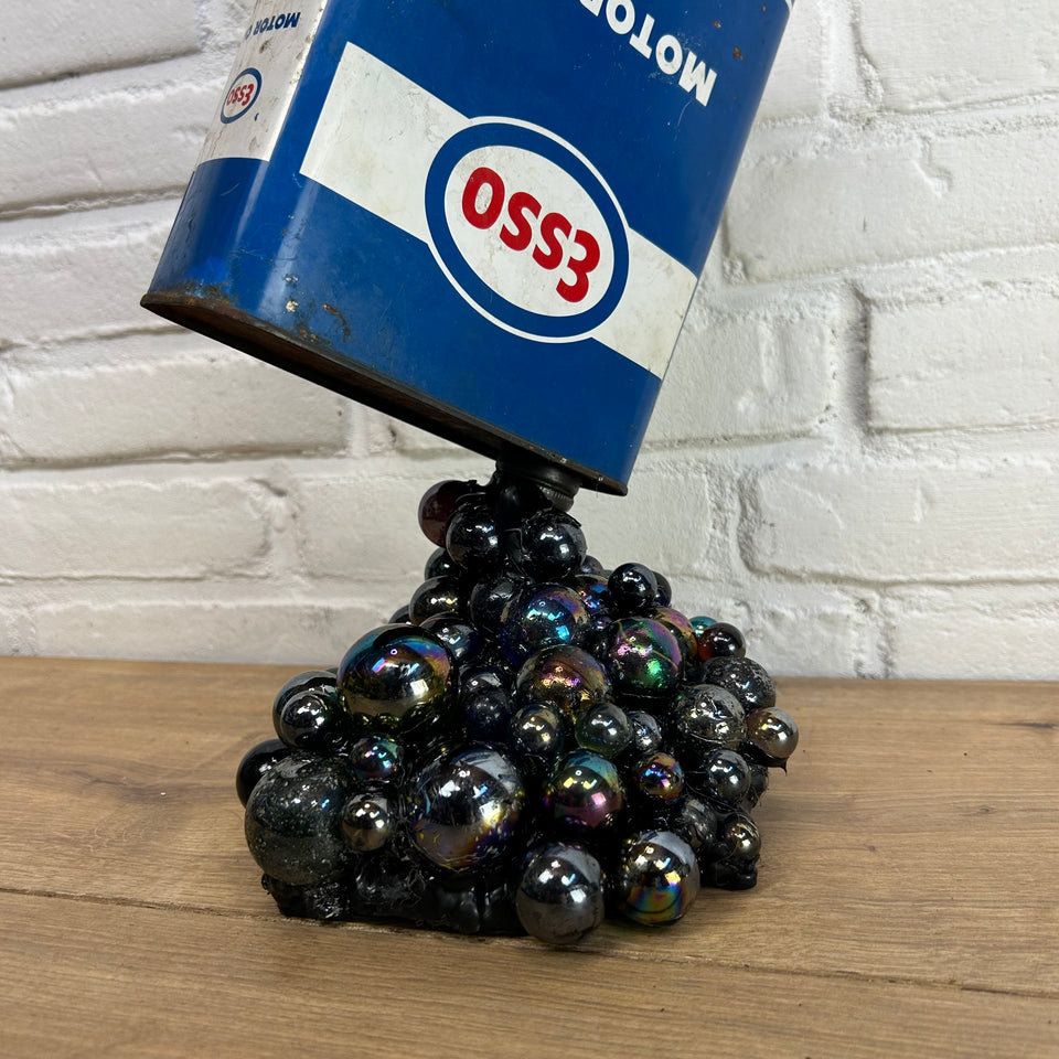 Esso oil can pouring Marbles statue