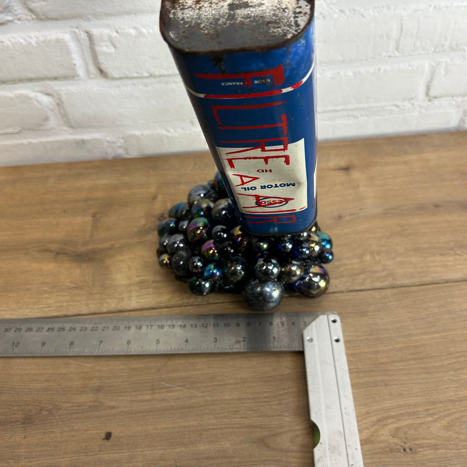 Esso oil can pouring Marbles statue