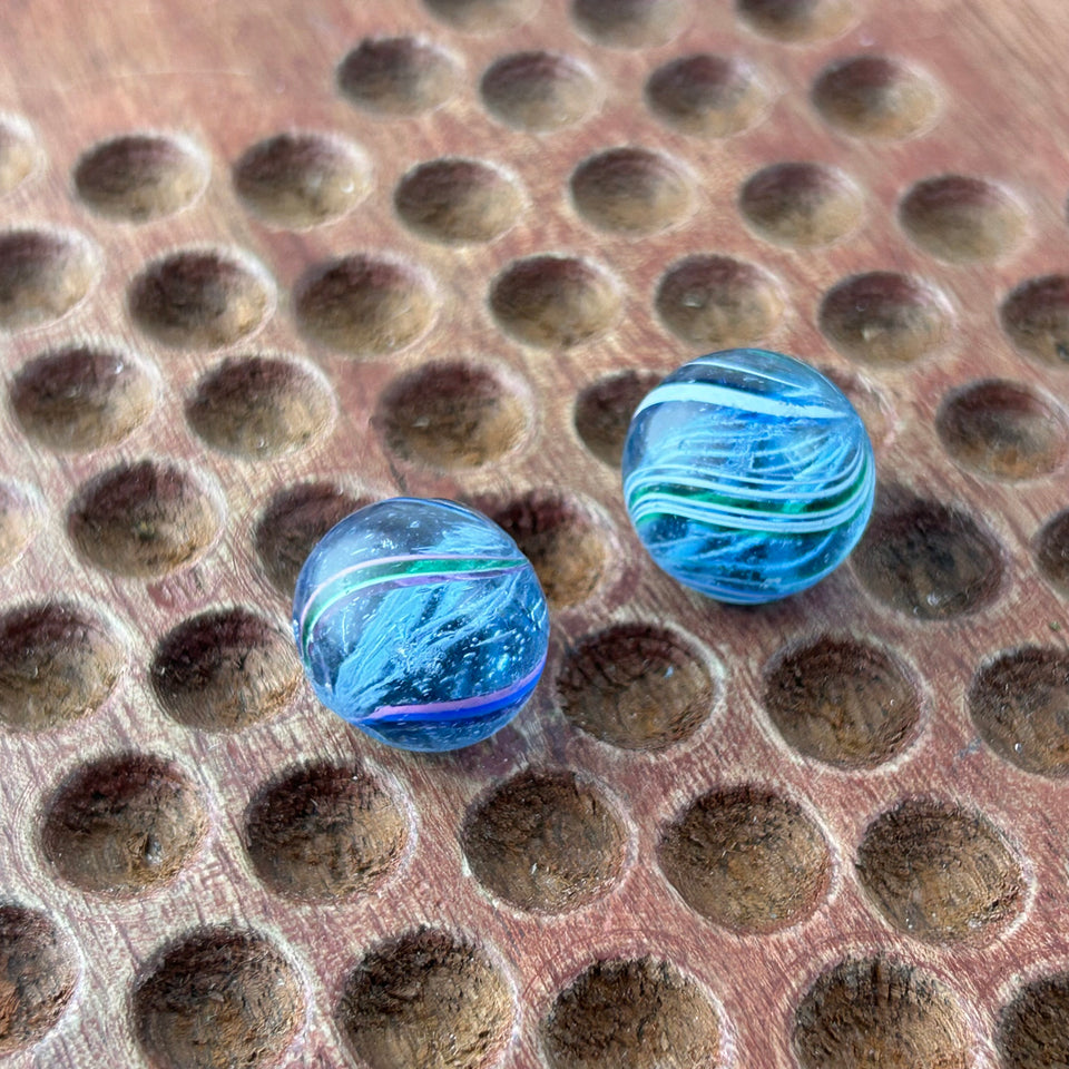 Two Antique handmade German Latino core swirl glass marbles
