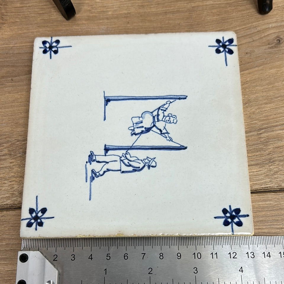 A set of three Delfts Blue ceramic tiles