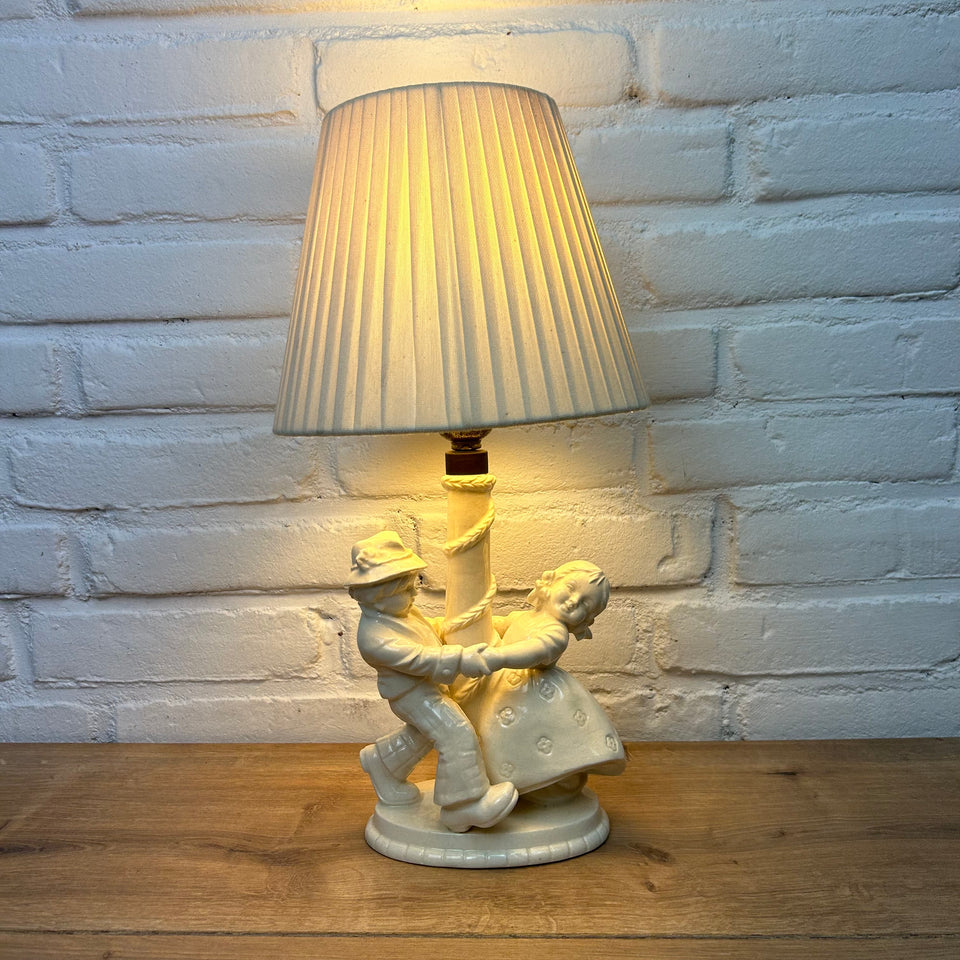 IN AUCTION : Antique Porcelain Children figurines, playing Lamp holder with Santa & Cole lampshade