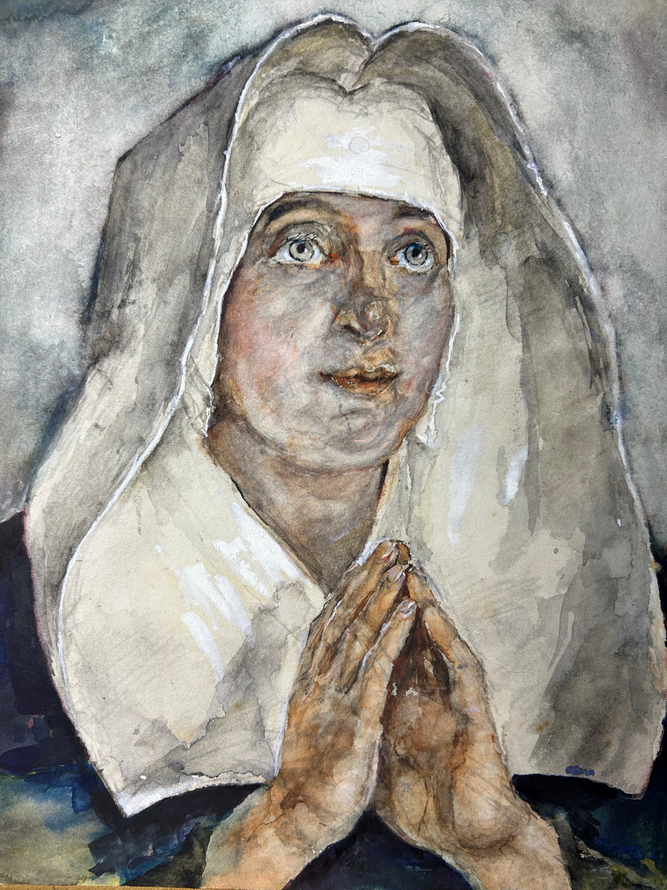 Watercolor of a praying nun