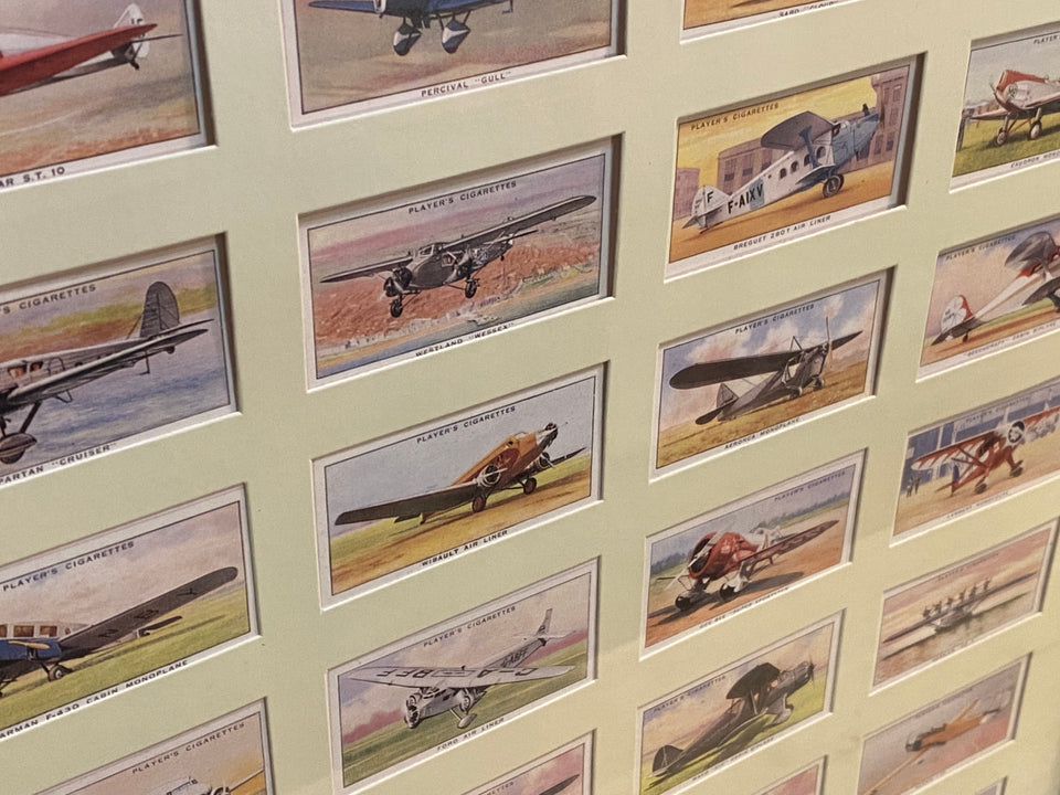 Collection of Airplane cigar bands - framed behind glass