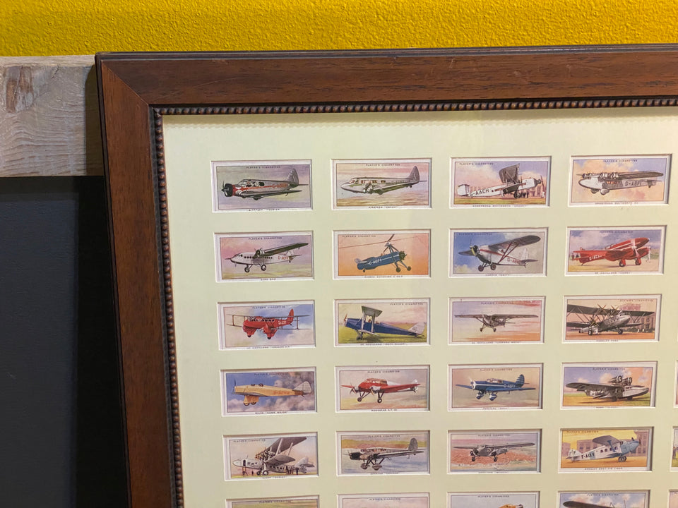 Collection of Airplane cigar bands - framed behind glass