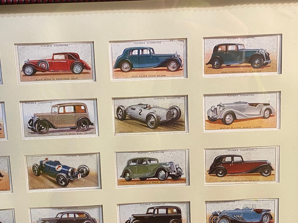 Collection of Automobile cigar bands - framed behind glass