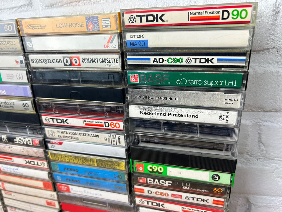 A bulk lot of 100 mixed cassette tapes (buy more with 10 percent more for free)