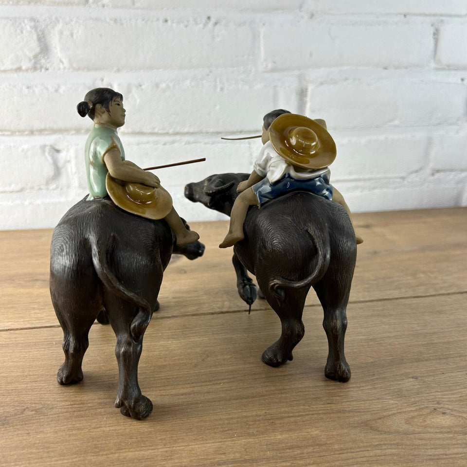 Shiwan Mudman Pottery Ceramic -  Boy and girl riding water buffalo's