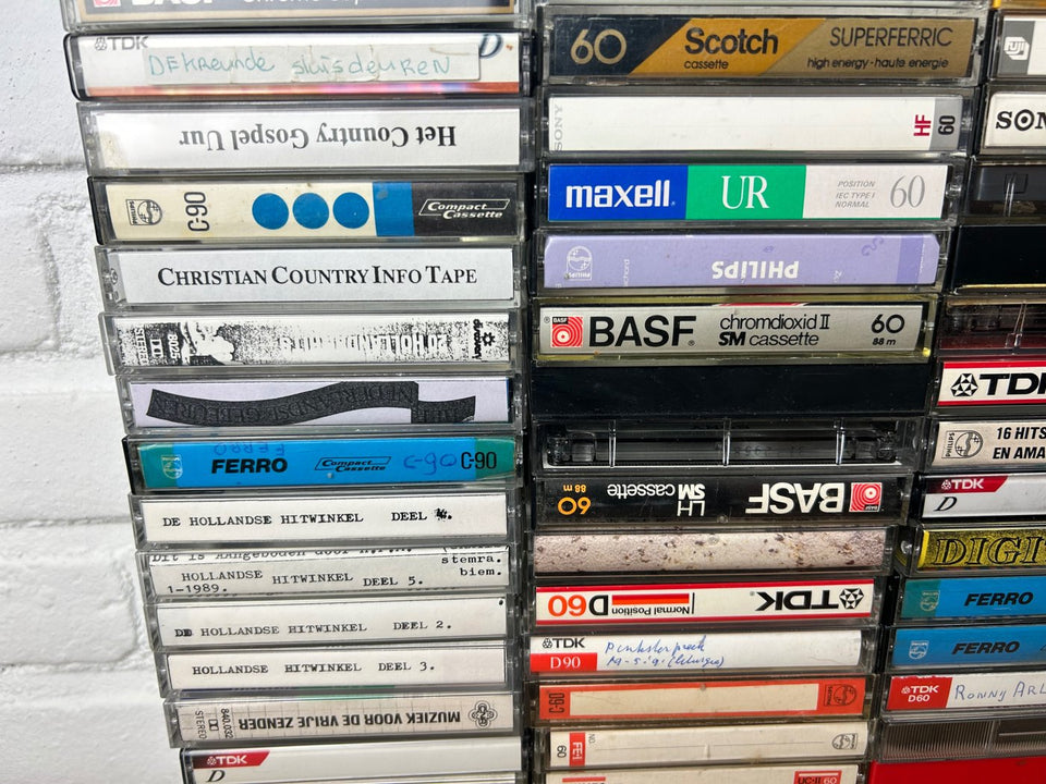 A bulk lot of 100 mixed cassette tapes (buy more with 10 percent more for free)