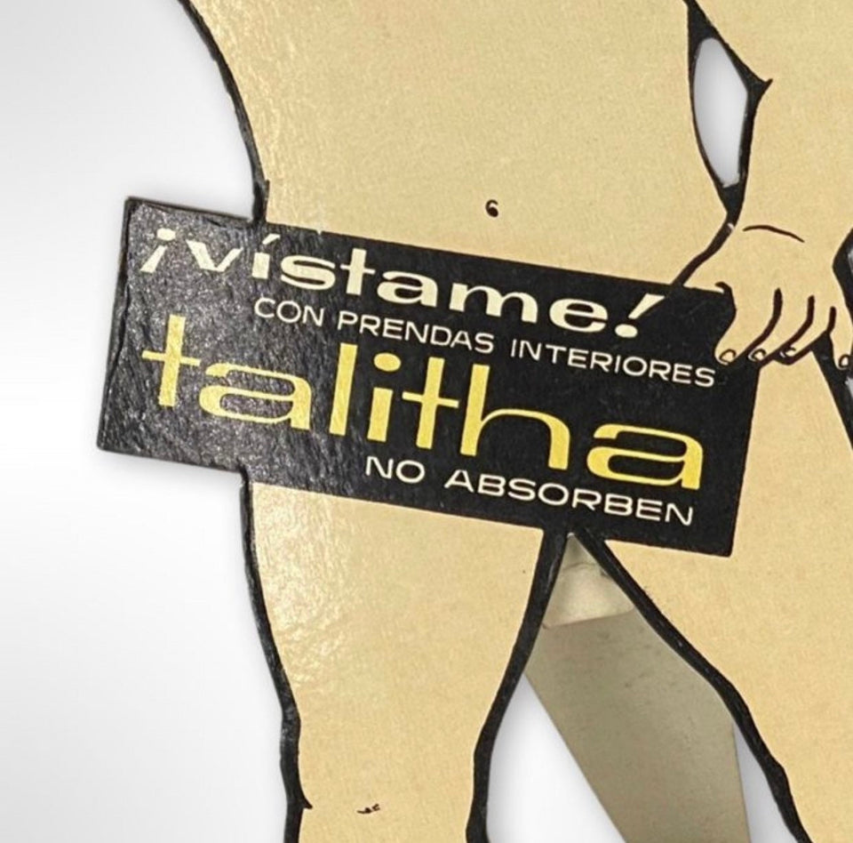 Vintage ad sign for Talitha.