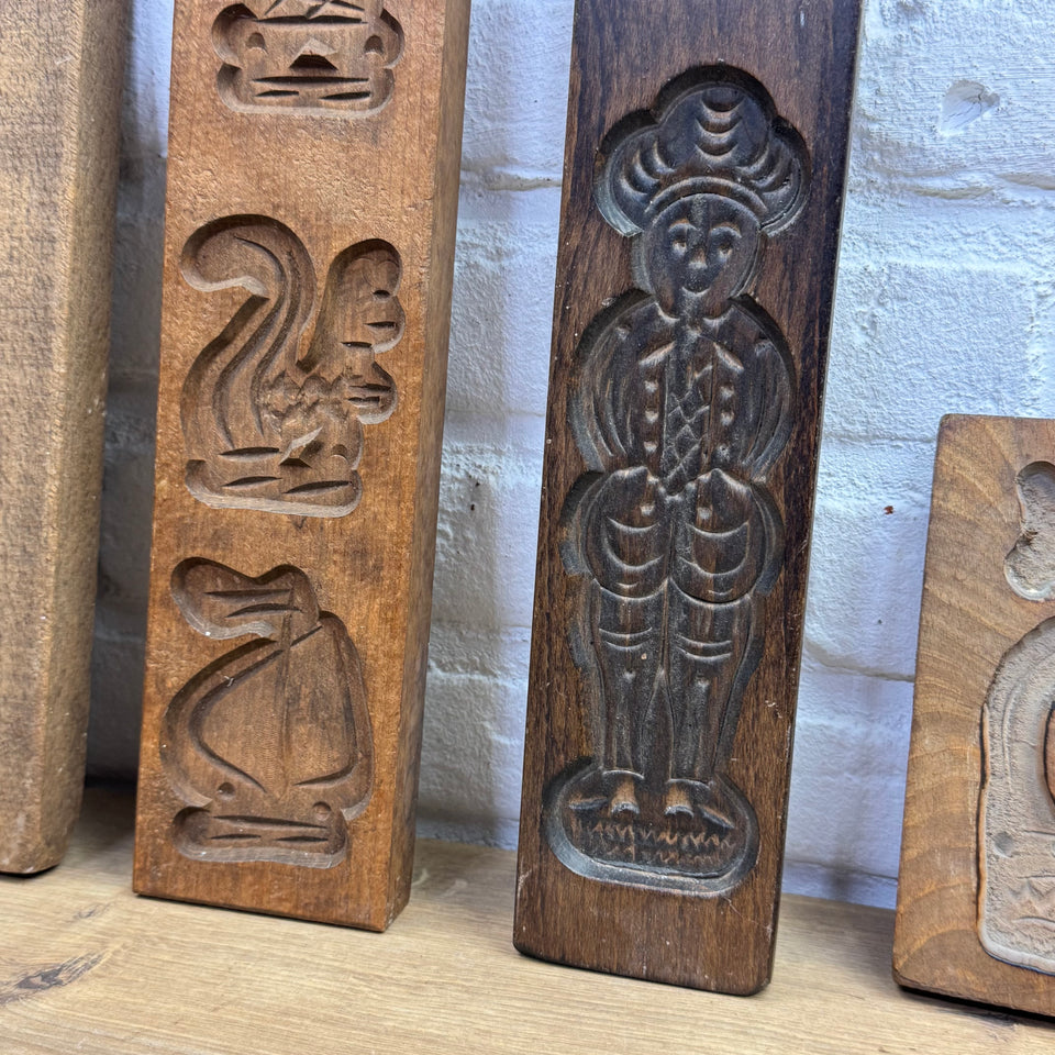 Antique set of five European wooden baking molds