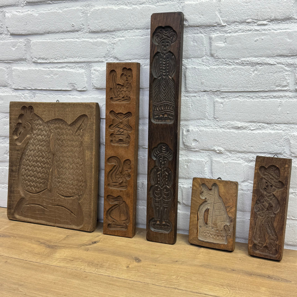 Antique set of five European wooden baking molds