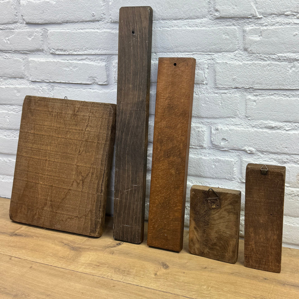 Antique set of five European wooden baking molds
