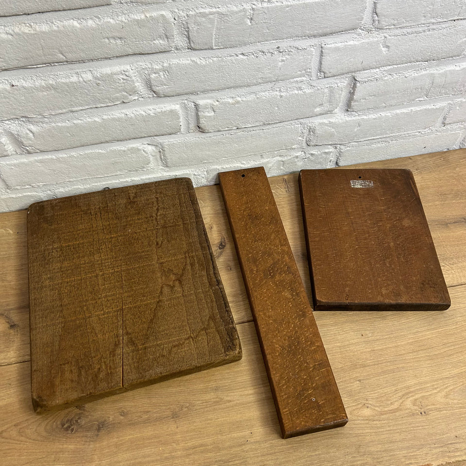 Antique set of three wooden baking molds