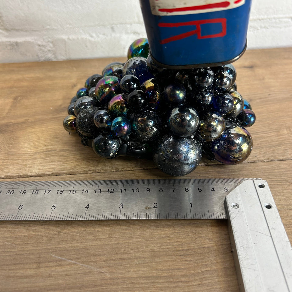 Esso oil can pouring Marbles statue