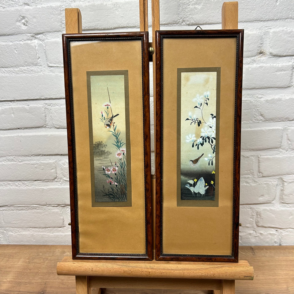 Two Handpainted Asian floral & bird paintings behind frame