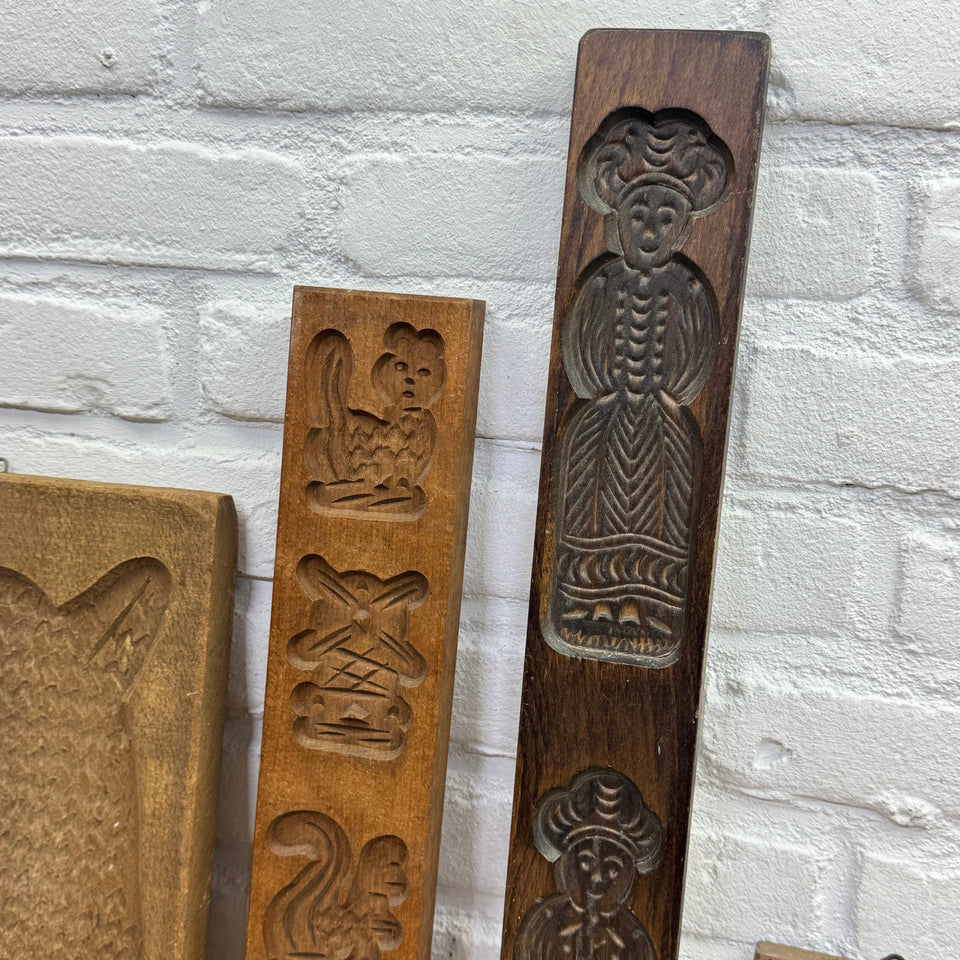 Antique set of five European wooden baking molds