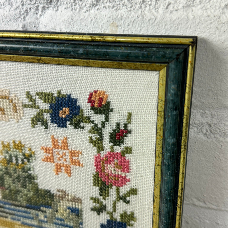 Large antique pattern Embroidery Sampler framed behind matt glass