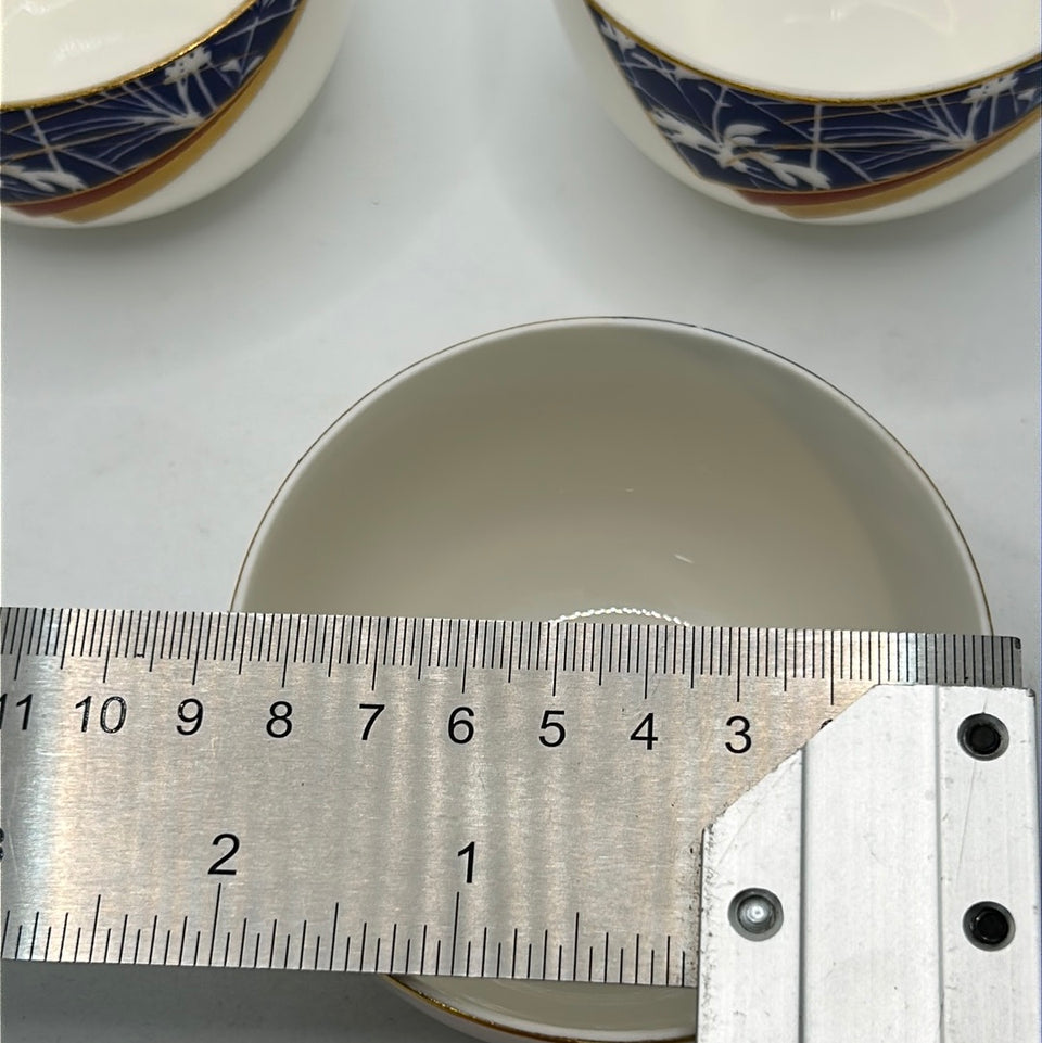 Three Japanese porcelain cups by Narumi Japan