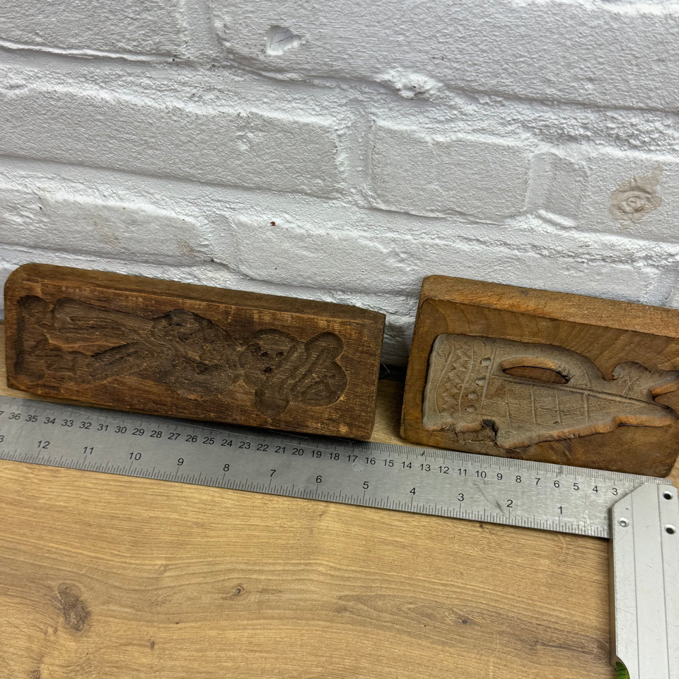Antique set of five European wooden baking molds