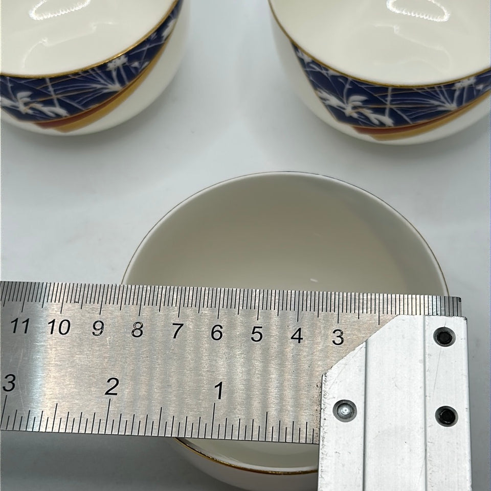 Three Japanese porcelain cups by Narumi Japan