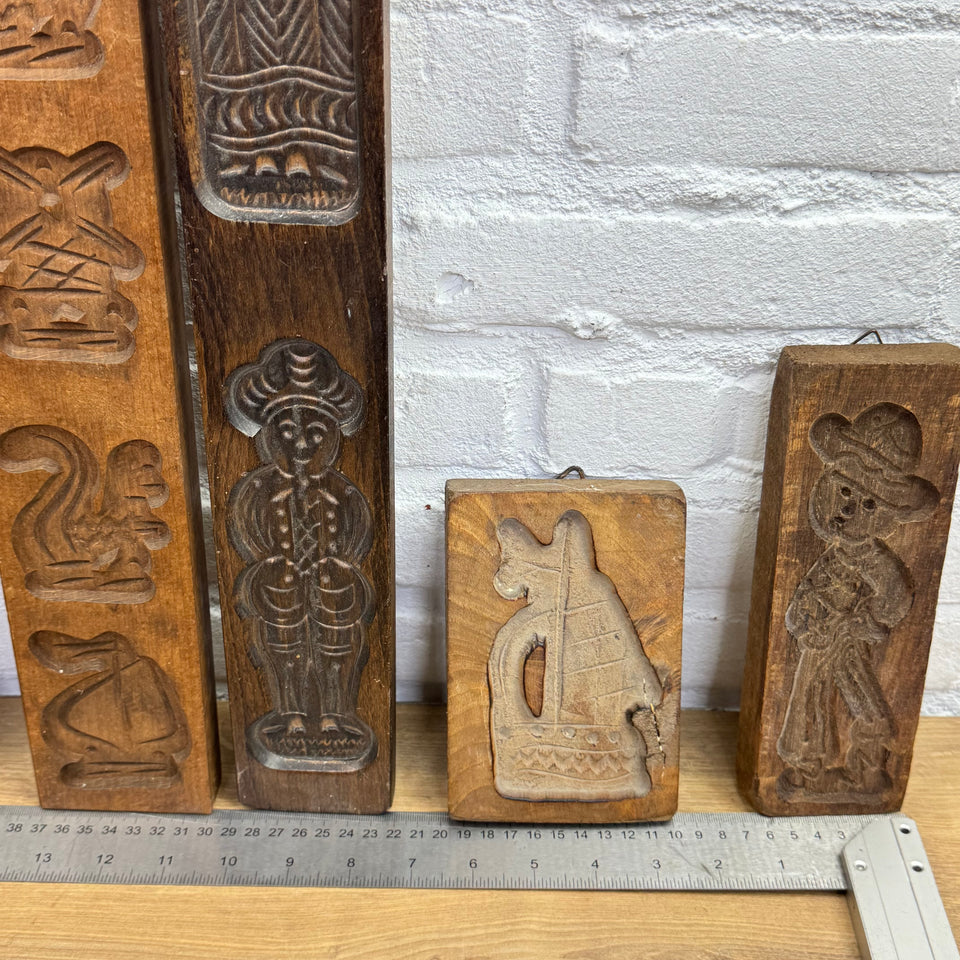 Antique set of five European wooden baking molds