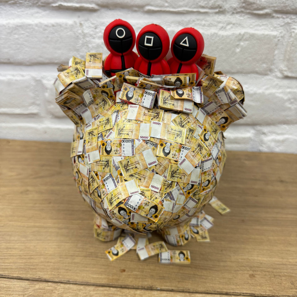 The PiggyBank Squid Art Game characters on Piggy bank