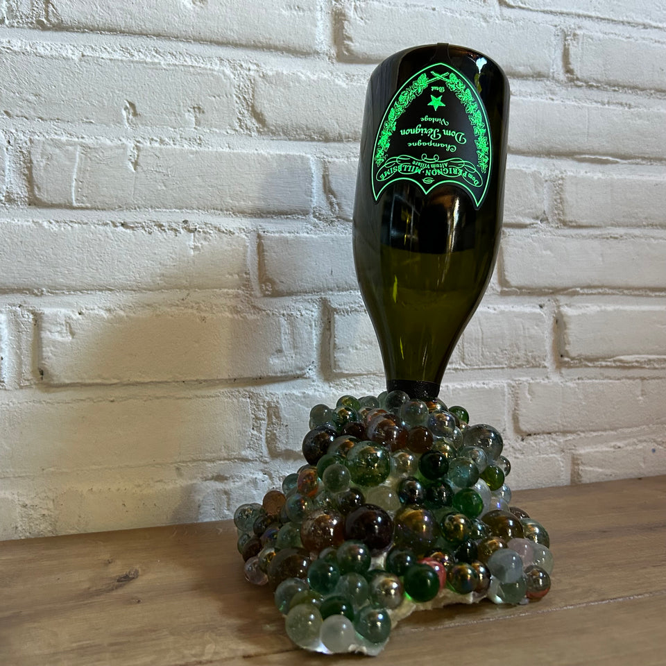 Dom Pérignon Bottle pouring Marbles statue