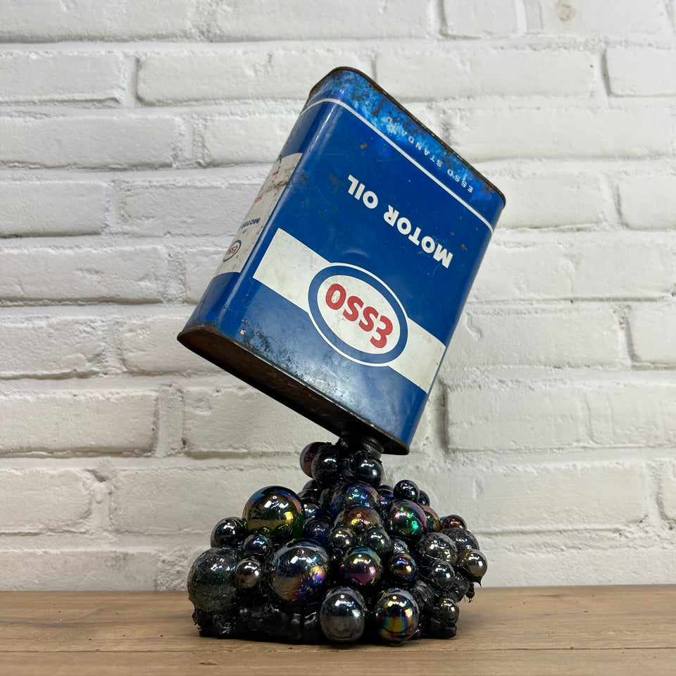 Esso oil can pouring Marbles statue