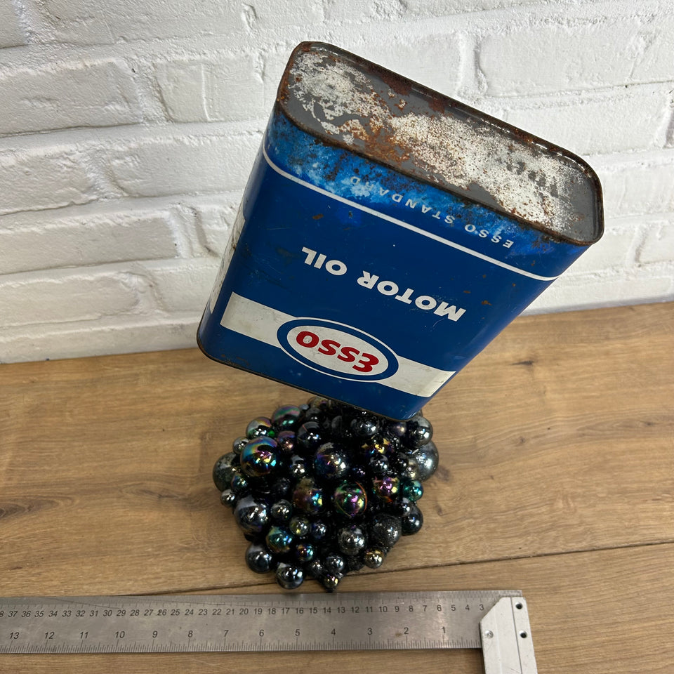 Esso oil can pouring Marbles statue