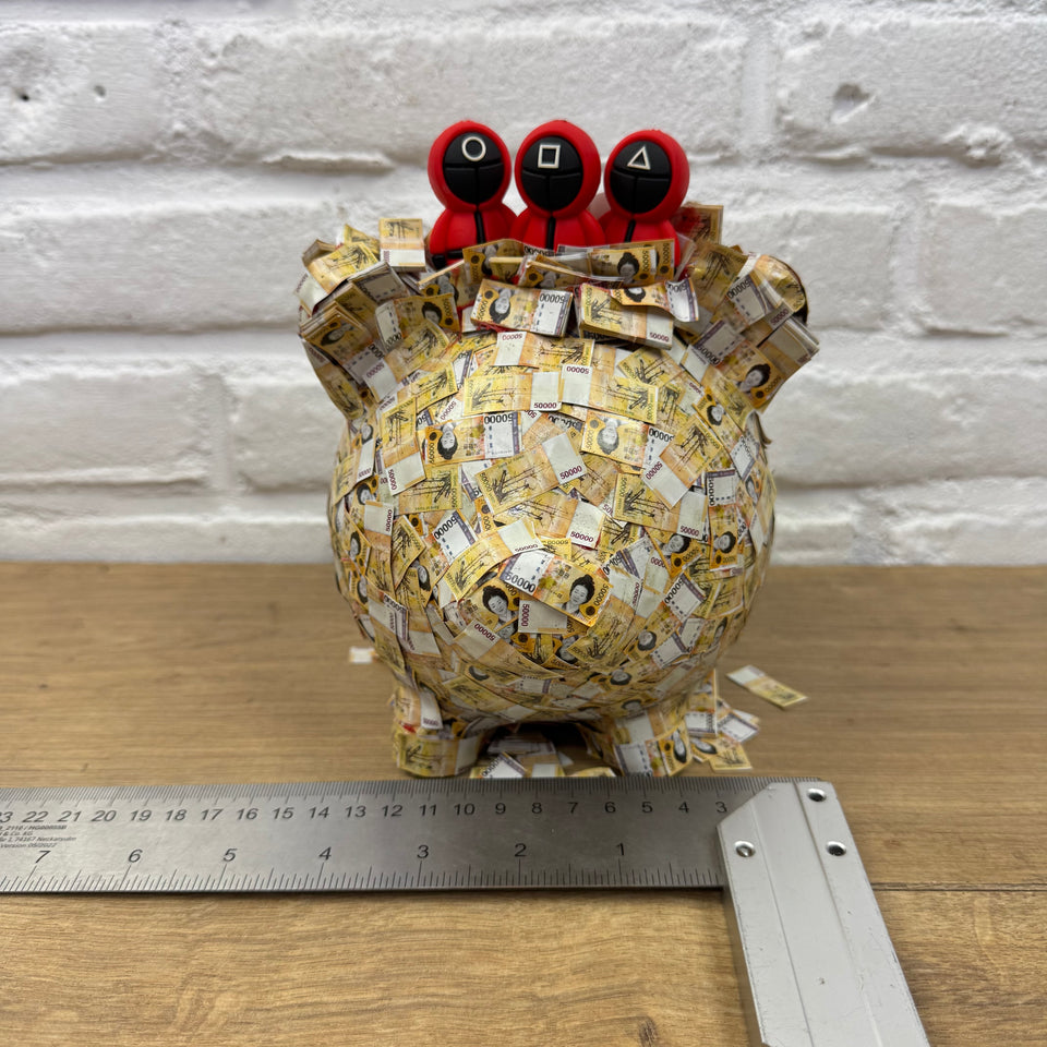 The PiggyBank Squid Art Game characters on Piggy bank