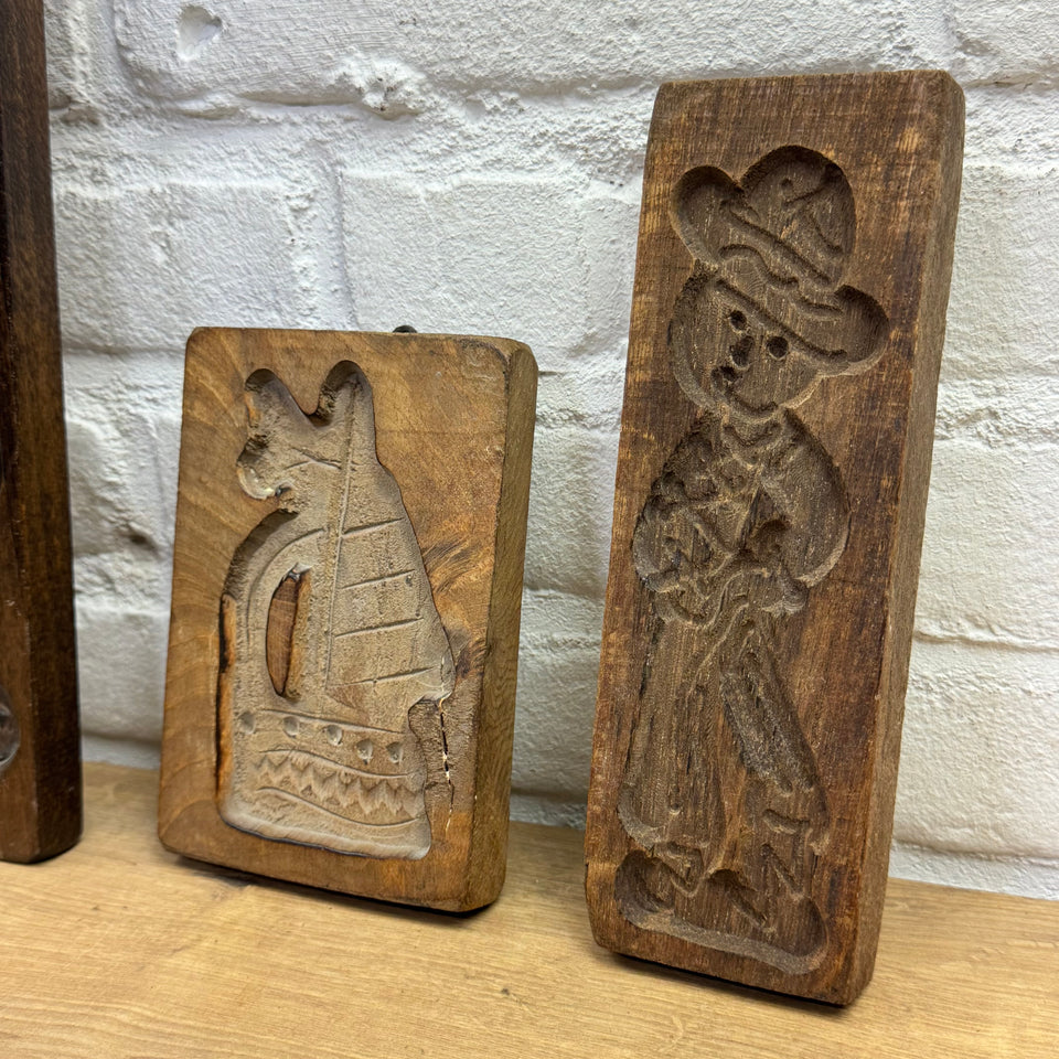 Antique set of five European wooden baking molds