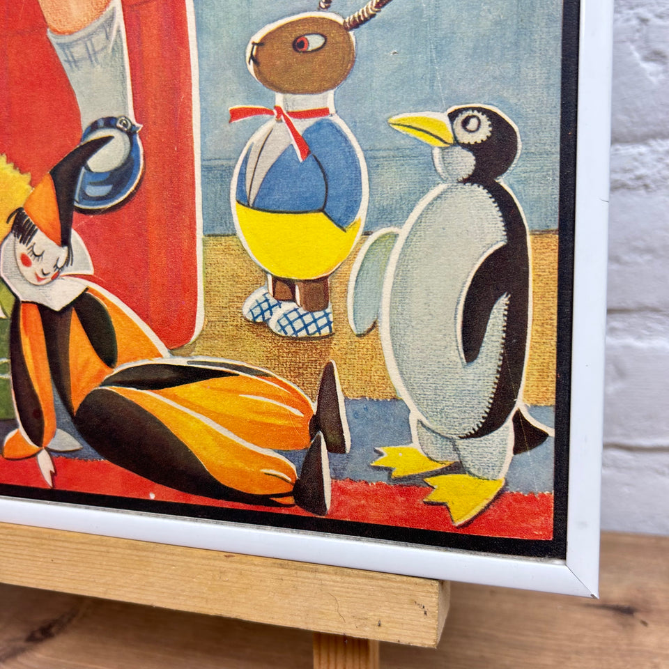 Vintage framed illustration of a boy reading a book for his toy friends