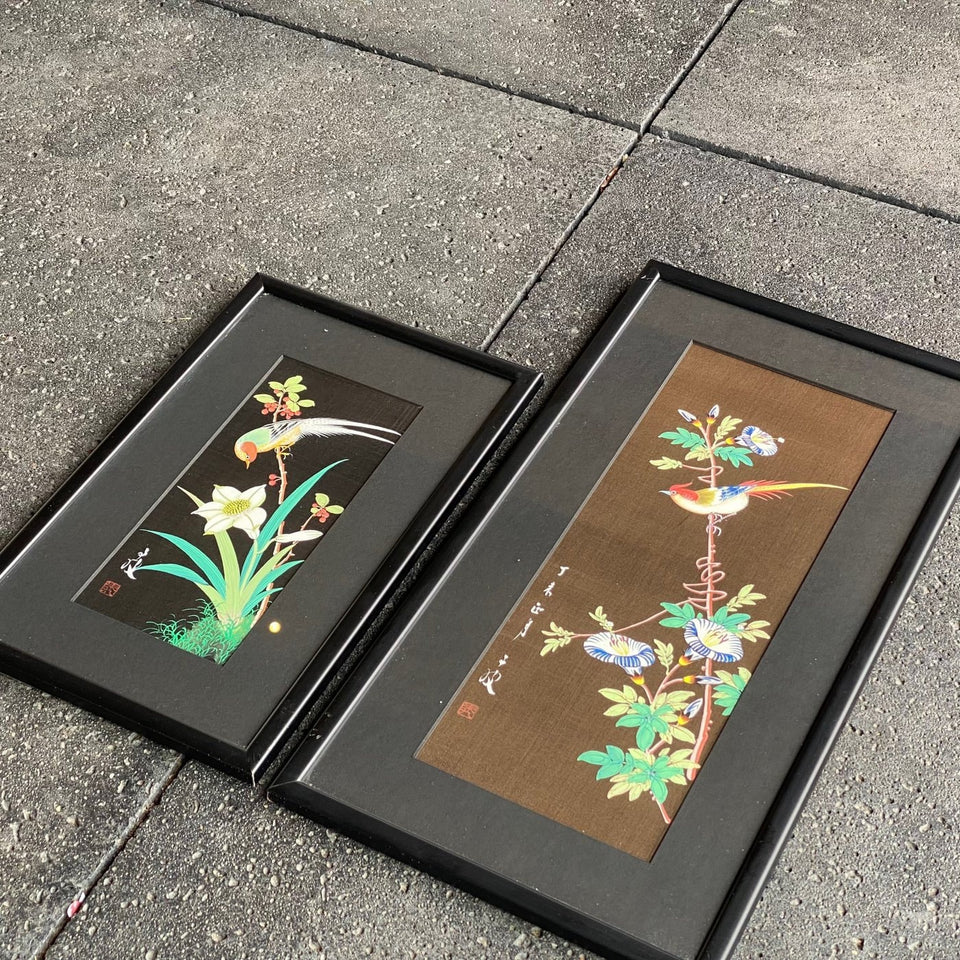 Two Chinese silk paintings flowers and birds - framed behind glass