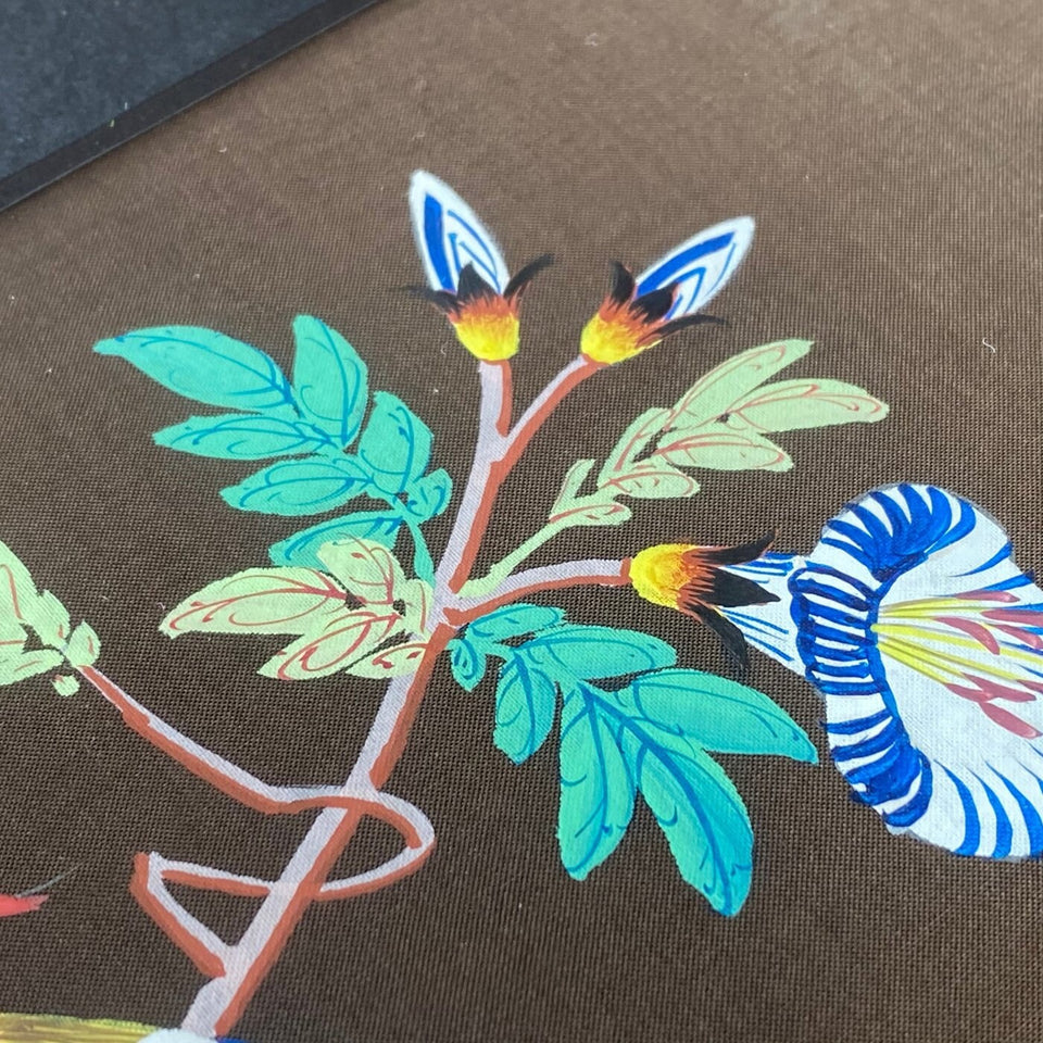 Two Chinese silk paintings flowers and birds - framed behind glass